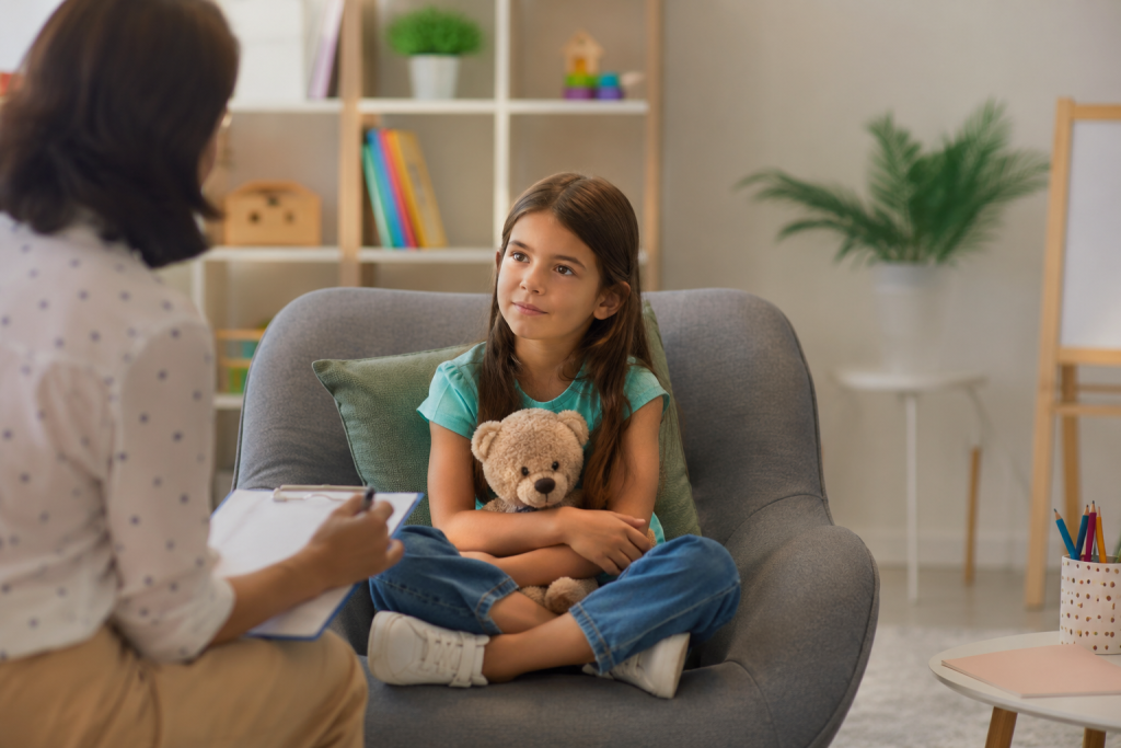 Child assessment session with therapist in clinic setting